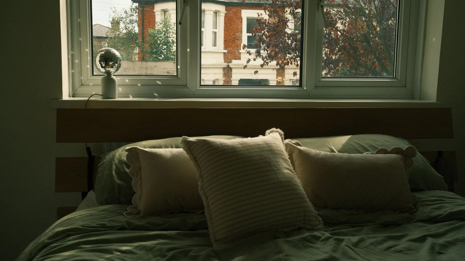 Morning light on a bed near a window